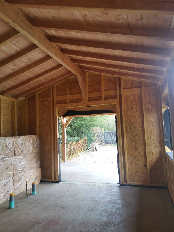 Maison ossature bois et charpente traditionnelle